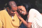 Young couple having fun in park