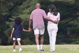 Family walking in a park