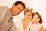 Happy parents with their little girl