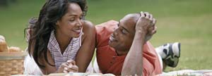Married couple enjoying a picnic