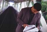 Businessman reading the newspaper