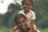 Man carrying his daughter
