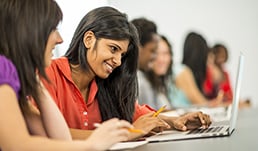 Student studying with a laptop