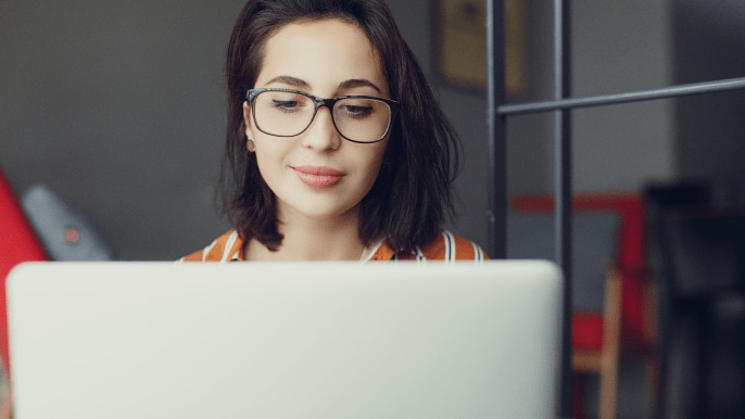 Someone looking at laptop screen