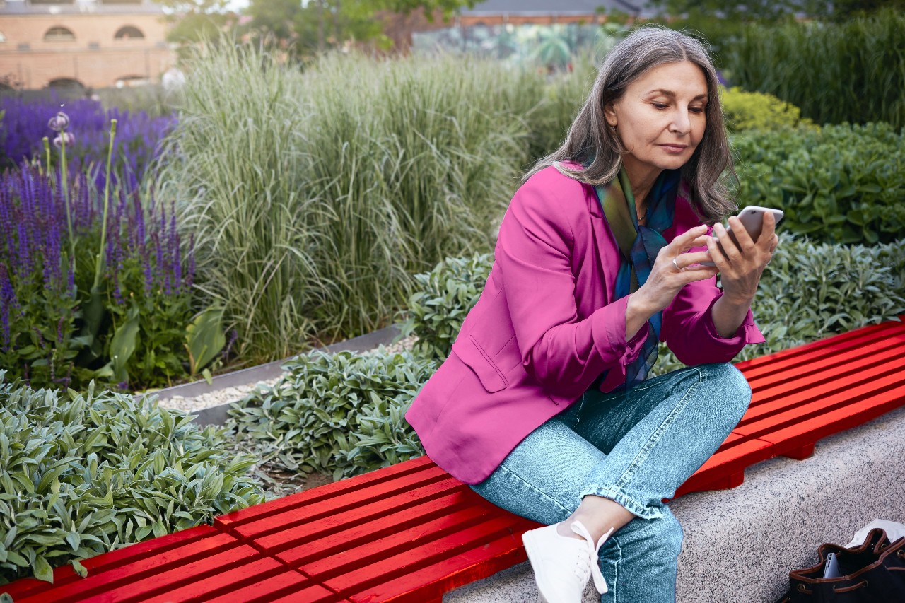 Woman who is mobile banking