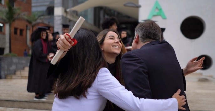 Woman with graduation diploma