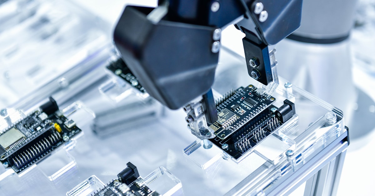 Computer chip being installed using machine