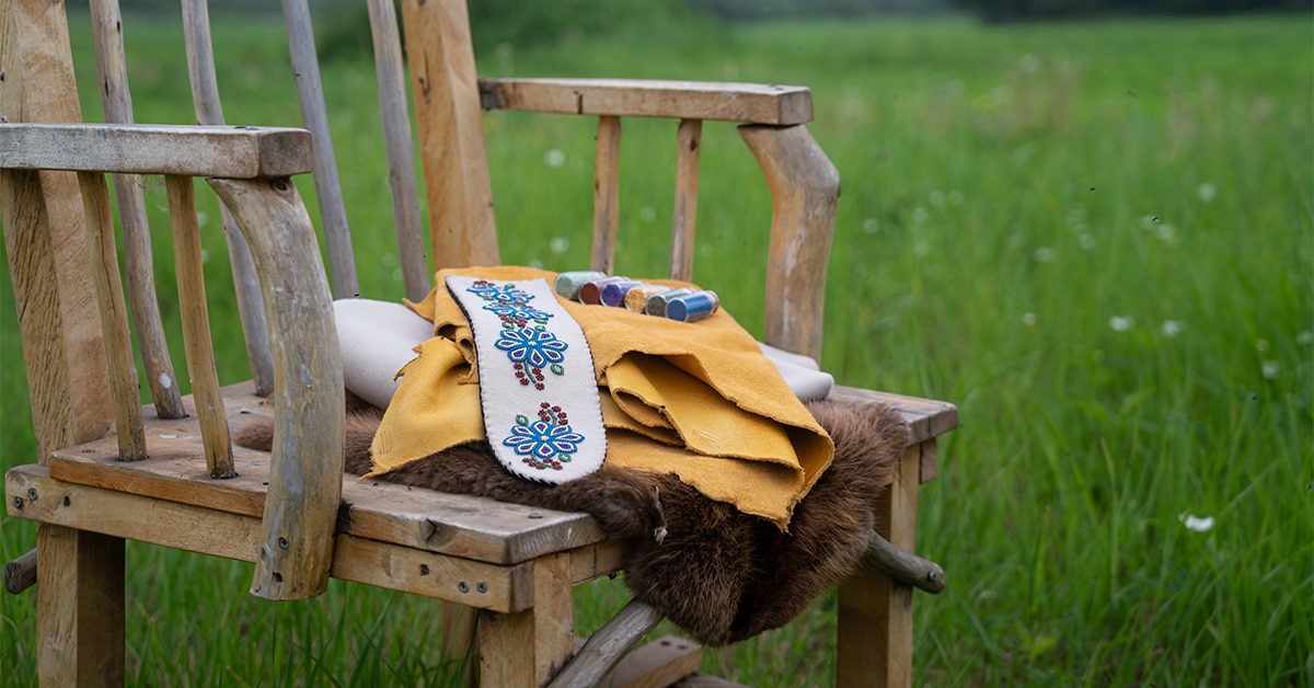 Mukluks material on chair in field