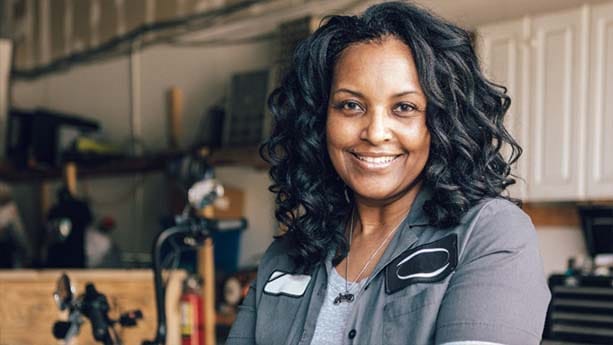 A woman small business owner in a workshop.