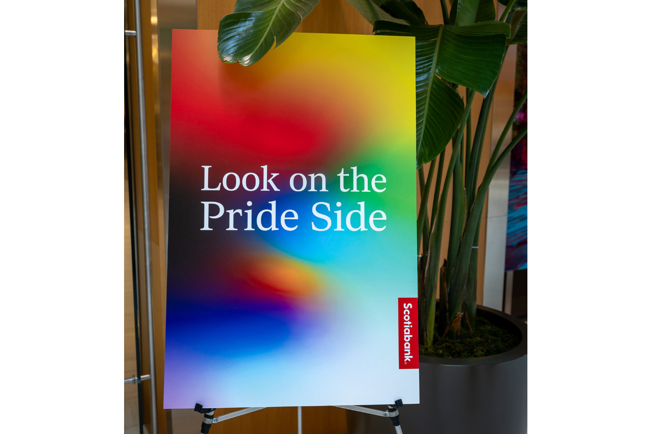 'Look on the Pride Side' sign at event