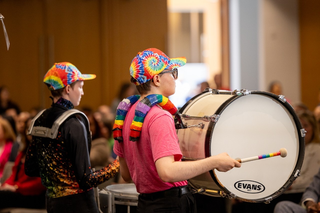 Woman speaking at podium after event