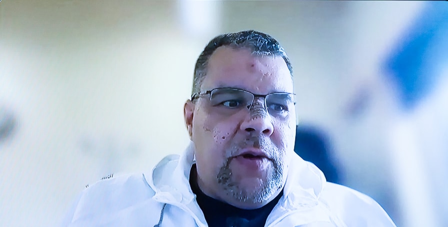 Andy Moorhouse in video call speaking at summit