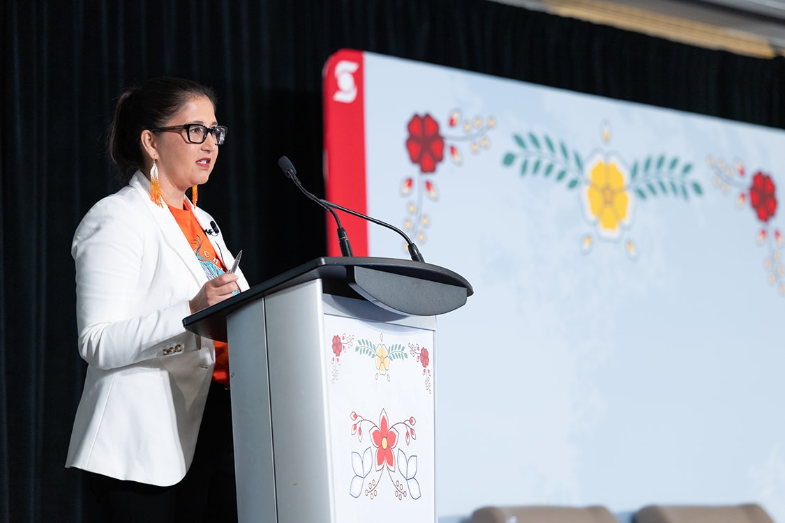 Dana Martin at podium