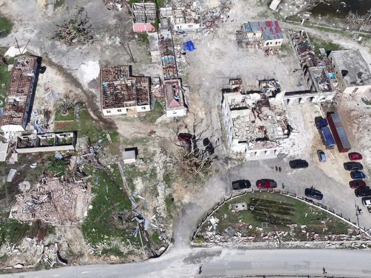 Drone perspective image of area with rooves missing from buildings