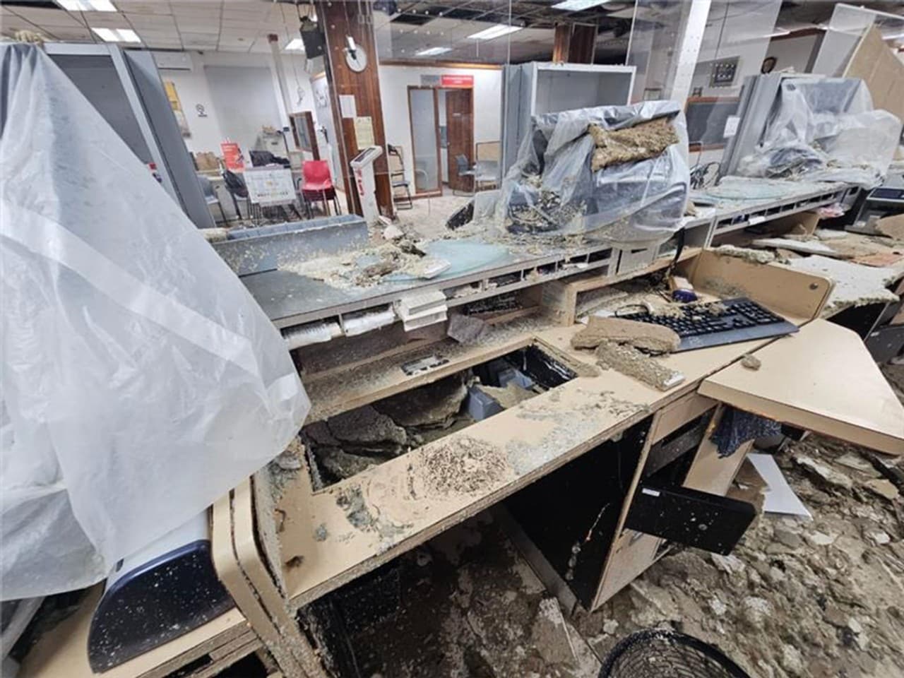 Debris seen throughout branch interior