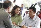 Couple purchasing a car.